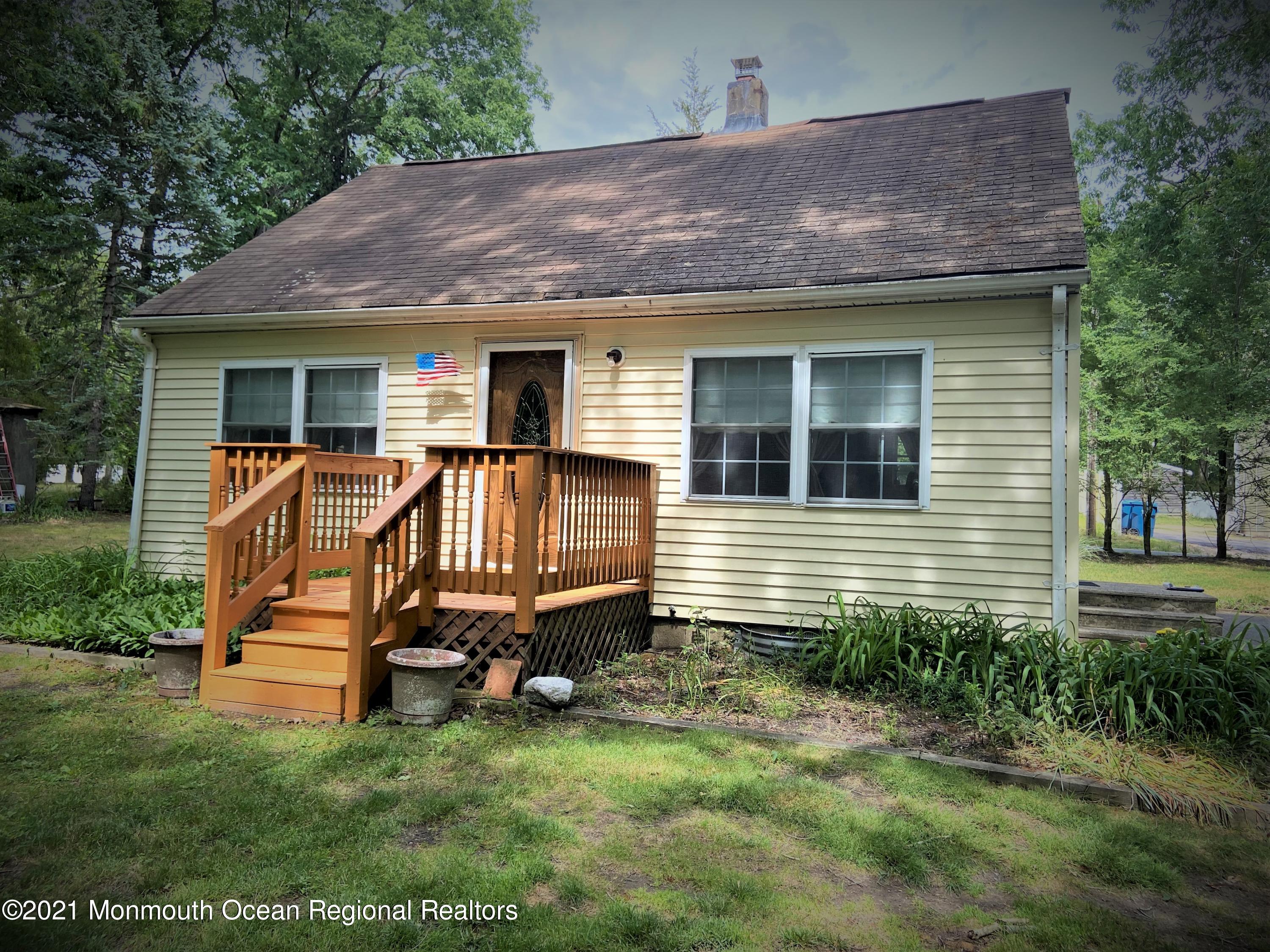 361 Black Oak Road Jackson, NJ 08527 - Photo 57 of 57 a view of a house with a yard and sitting area