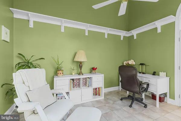 a bathroom with a toilet a sink and a window