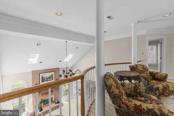 a room with gym equipment and a table