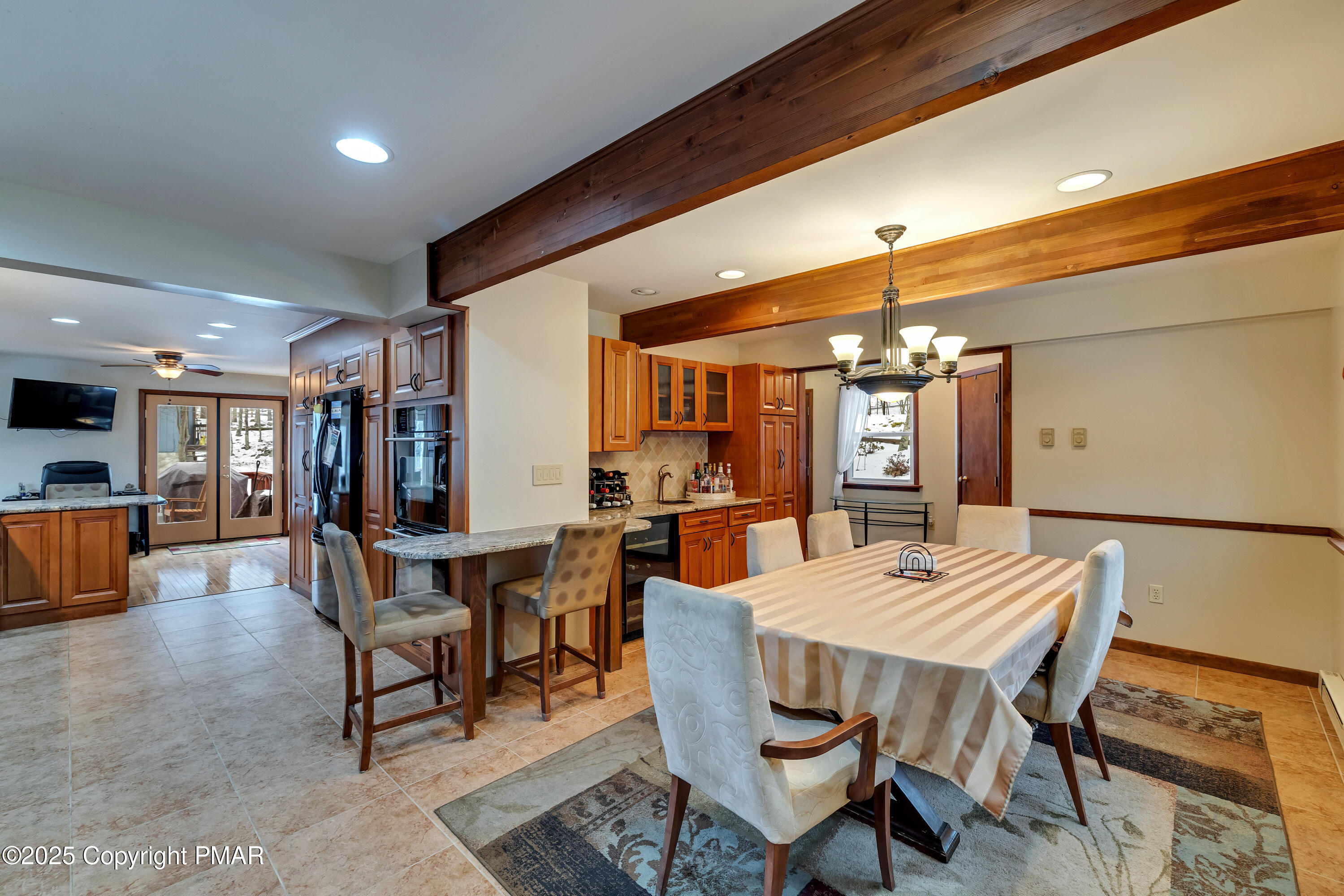 345 Canterbury Road Bushkill, PA 18324 - Photo 13 of 57 a view of a dining room with furniture