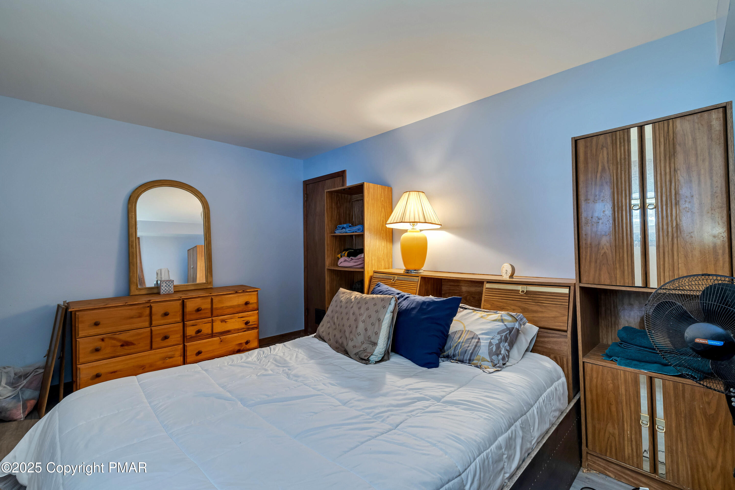 345 Canterbury Road Bushkill, PA 18324 - Photo 29 of 57 a bedroom with a bed and window