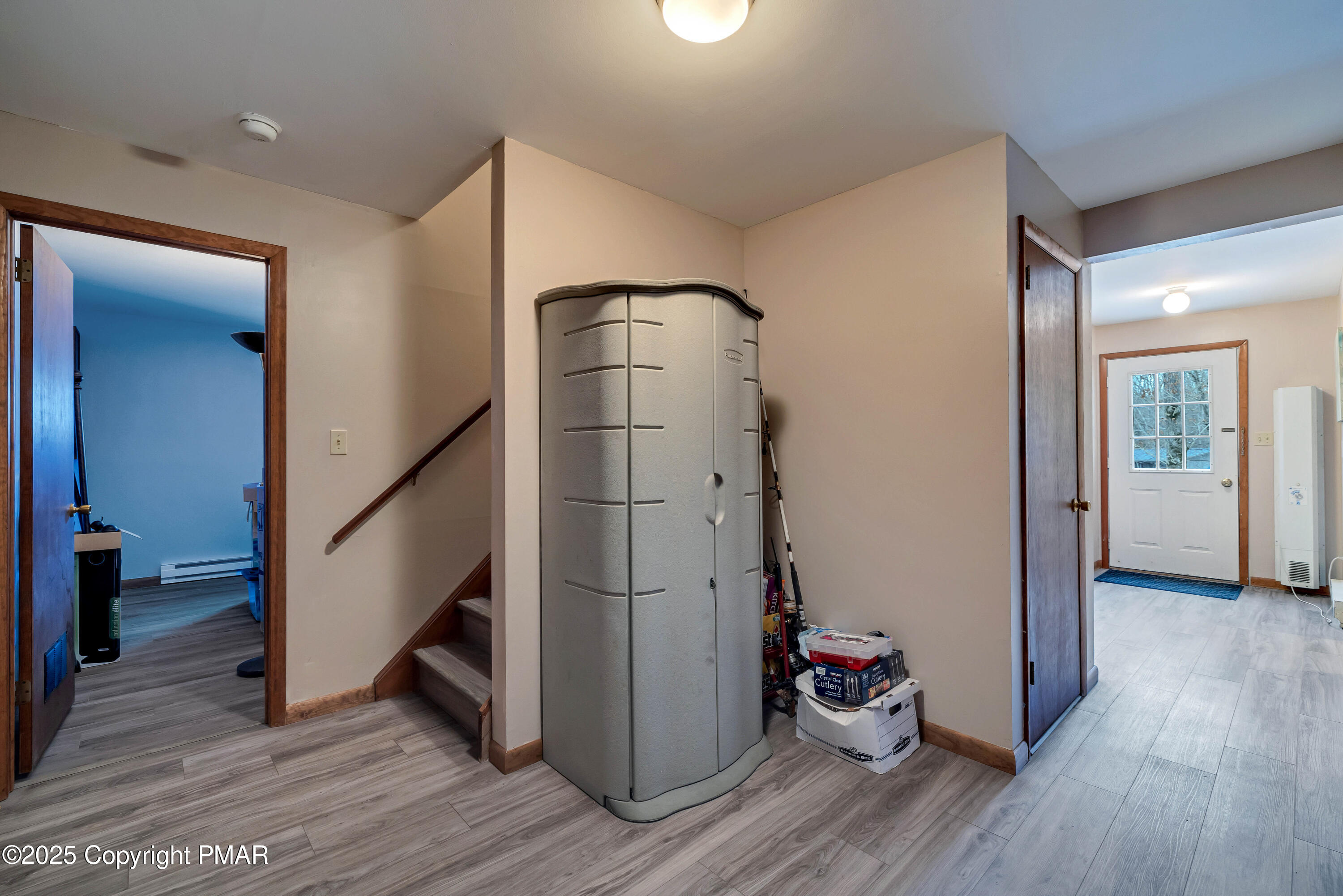 345 Canterbury Road Bushkill, PA 18324 - Photo 31 of 57 a view of an entryway with wooden floor and staircase