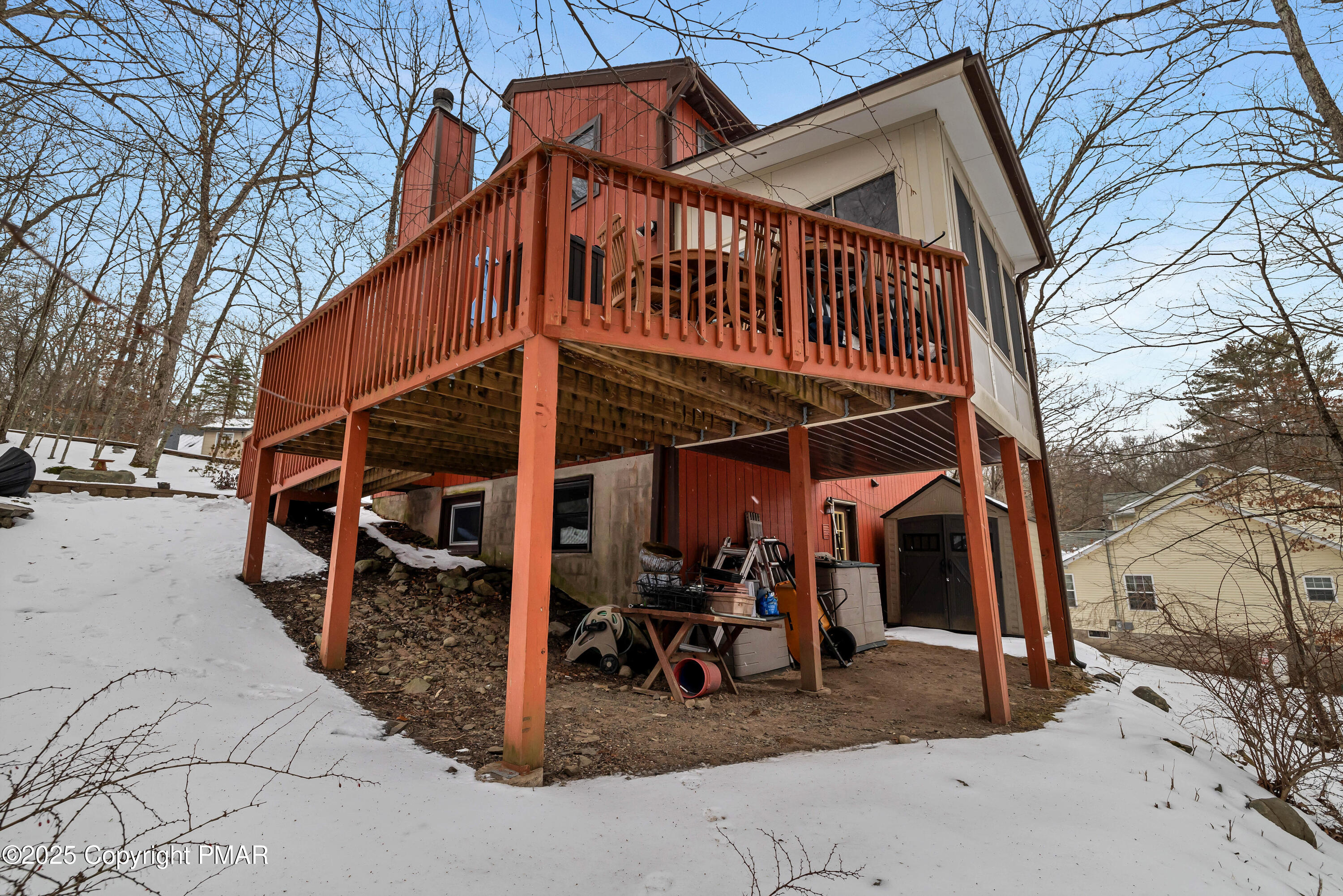 345 Canterbury Road Bushkill, PA 18324 - Photo 36 of 57 a view of a house with a patio