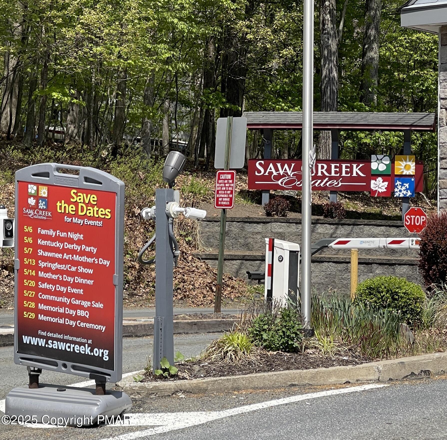 345 Canterbury Road Bushkill, PA 18324 - Photo 38 of 57 a front view of a building with street sign