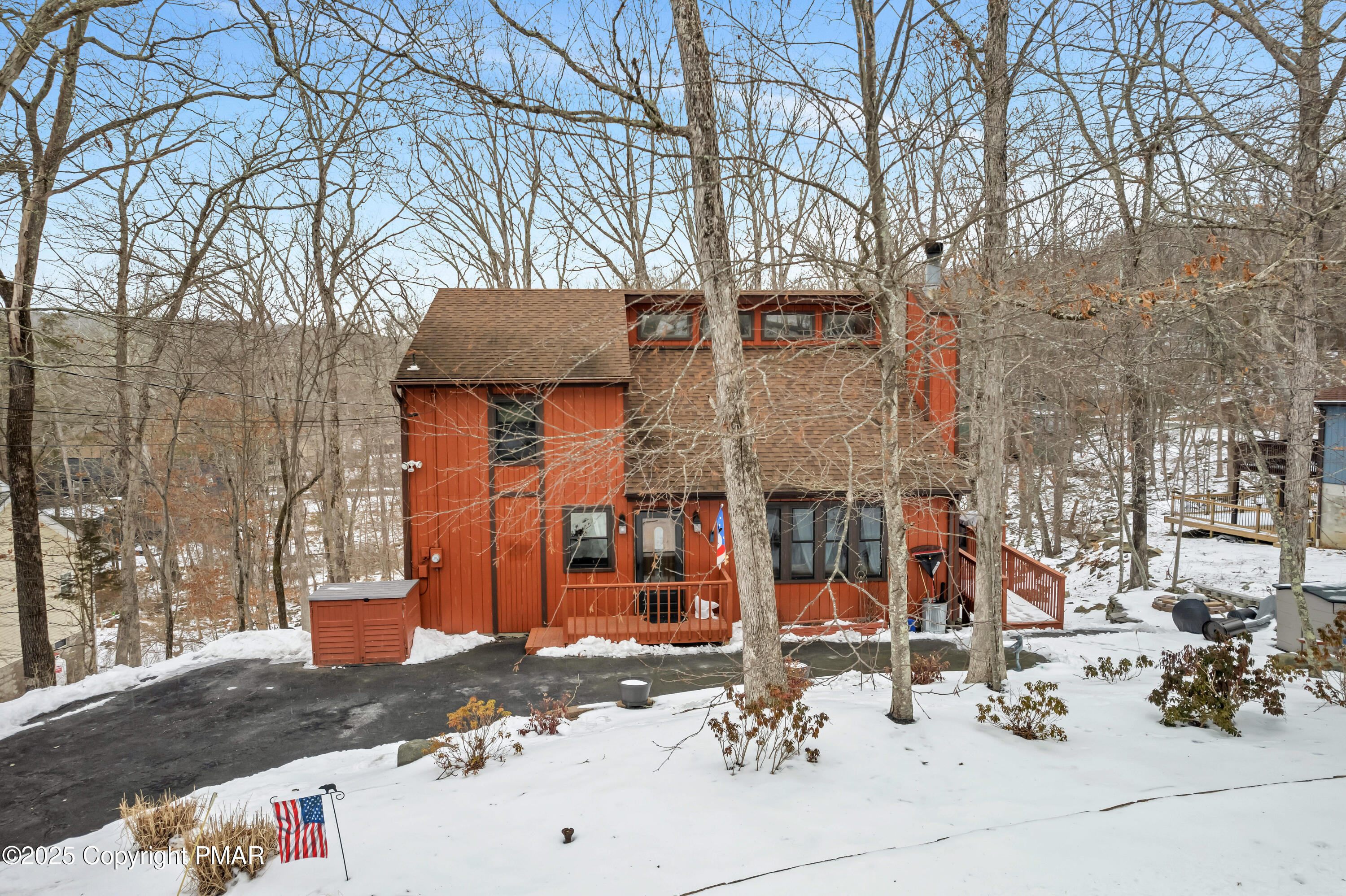 345 Canterbury Road Bushkill, PA 18324 - Photo 52 of 57 a front view of a building with street view