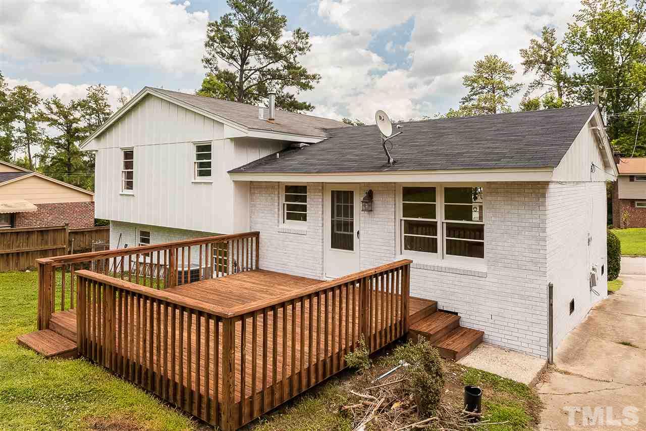 1537 Westchester Road Raleigh, NC 27610 - Photo 3 of 3 a view of a house with wooden fence