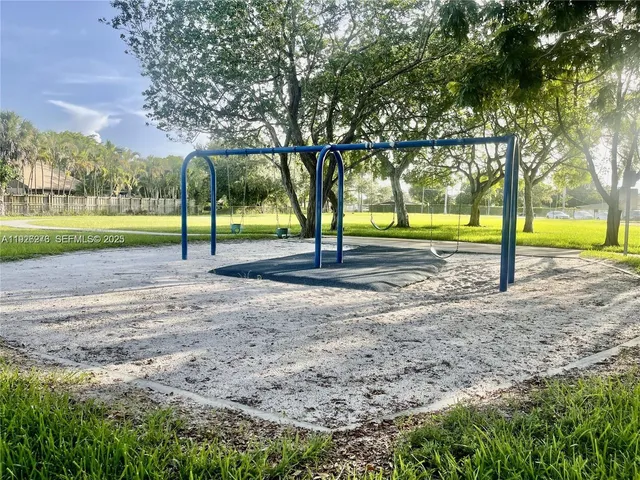 a view of building with yard