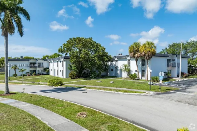 a view of street with tall buildings