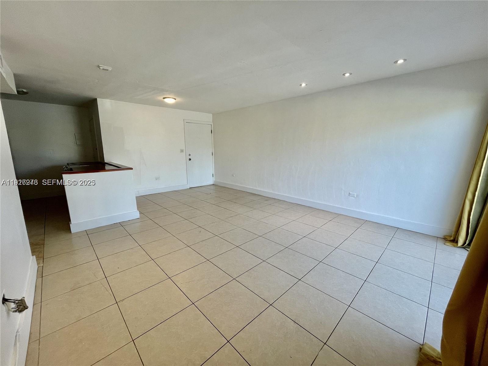 7250 Southwest 94th Place, Unit B6 Miami, FL 33173 - Photo 5 of 23 a view of an empty room