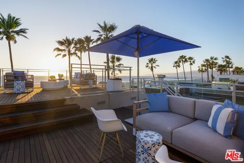 a view of a terrace with furniture