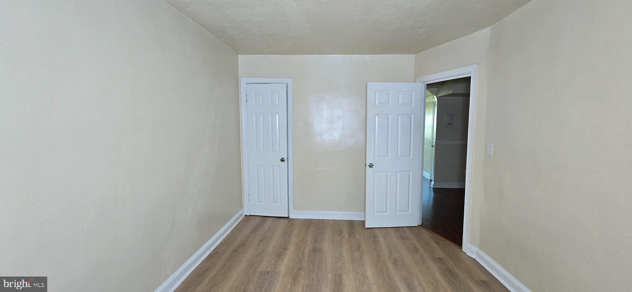 1255 Meigs Place Northeast, Unit 4 Washington, DC 20002 - Photo 11 of 15 a view of hallway with closet and wooden floor