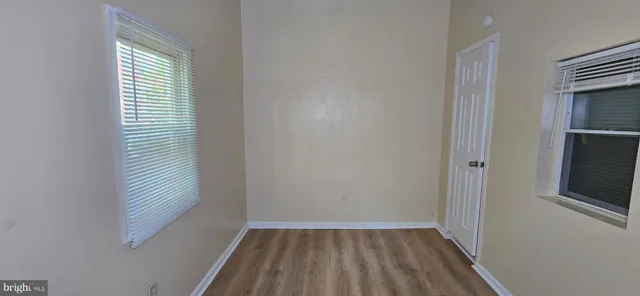 a view of a room that has a window