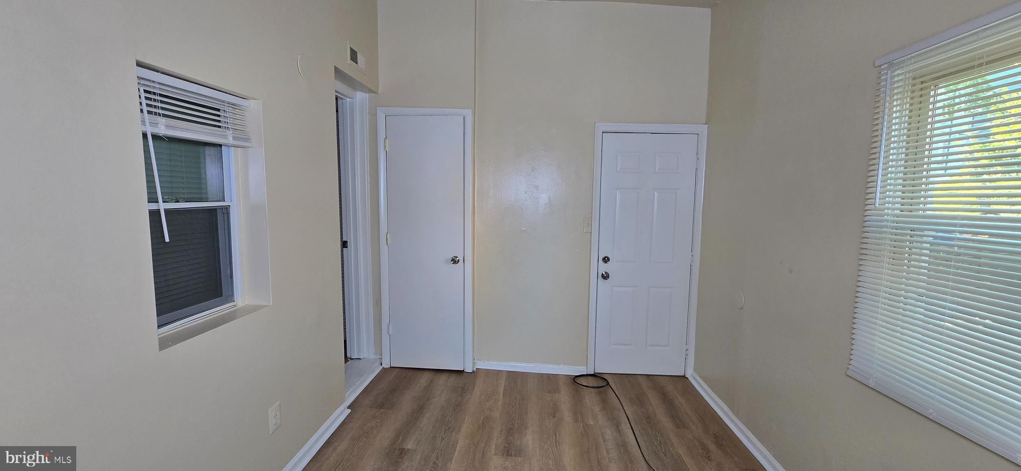 1255 Meigs Place Northeast, Unit 4 Washington, DC 20002 - Photo 15 of 15 a view of a hallway with wooden floor and a window