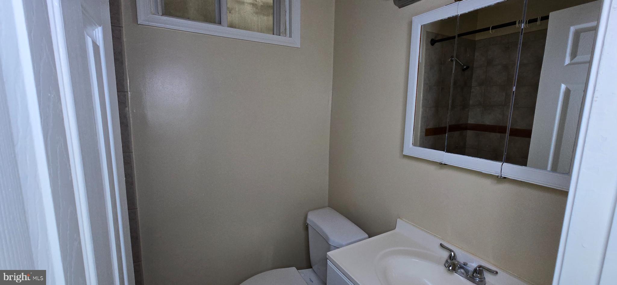 1255 Meigs Place Northeast, Unit 4 Washington, DC 20002 - Photo 8 of 15 a bathroom with a toilet