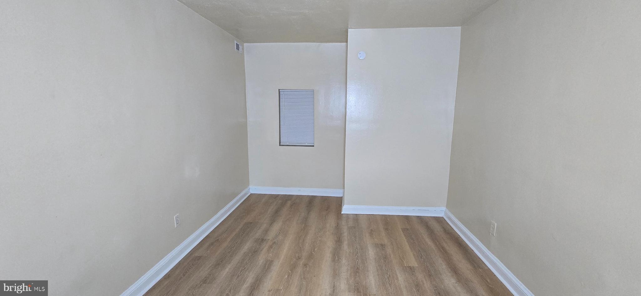 1255 Meigs Place Northeast, Unit 4 Washington, DC 20002 - Photo 10 of 15 a view of wooden floor in a room