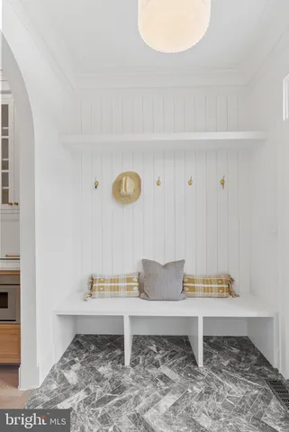 a terrace of a house with table and chairs