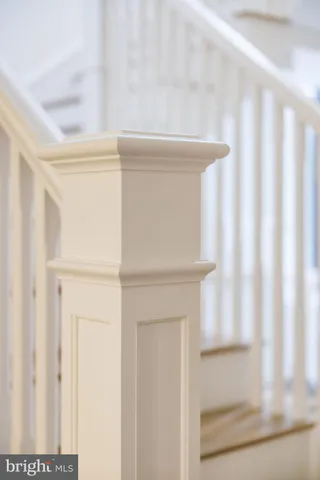 a kitchen with stainless steel appliances a sink stove and cabinets