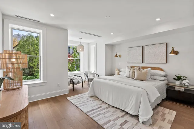a bathroom with a double vanity sink mirror and double
