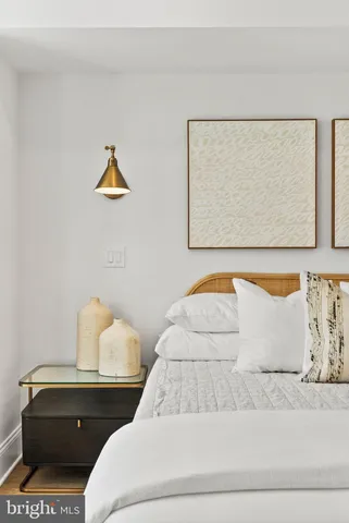 a bathroom with a bathtub and a sink