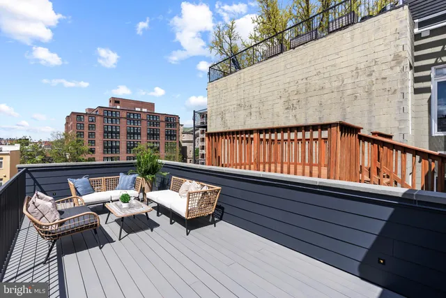 a bedroom with furniture and windows