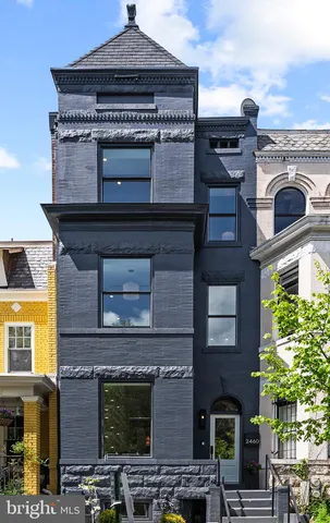 a view of a building with a street