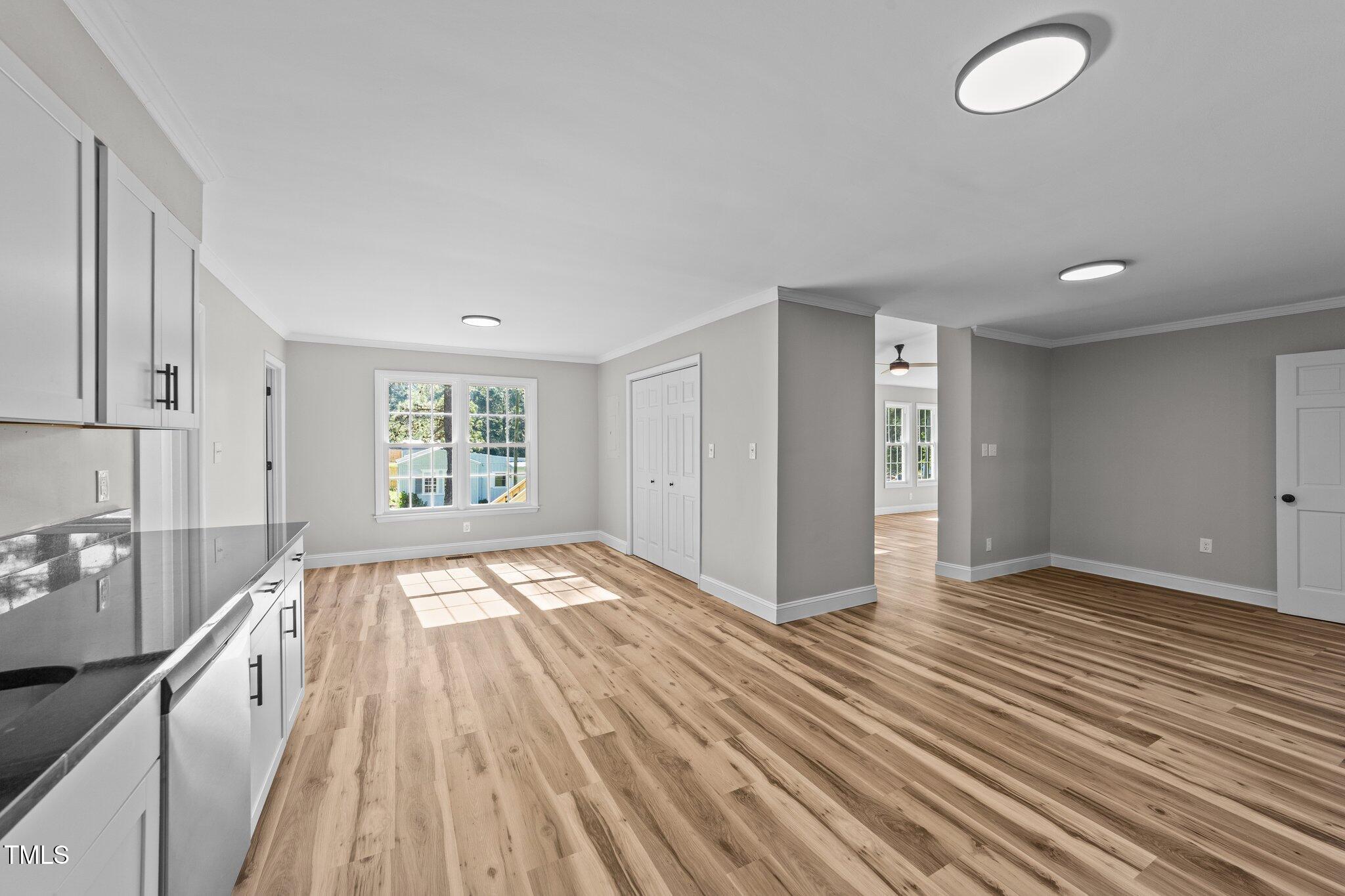 620 Richardson Road Zebulon, NC 27597 - Photo 18 of 52 a view of an empty room and window