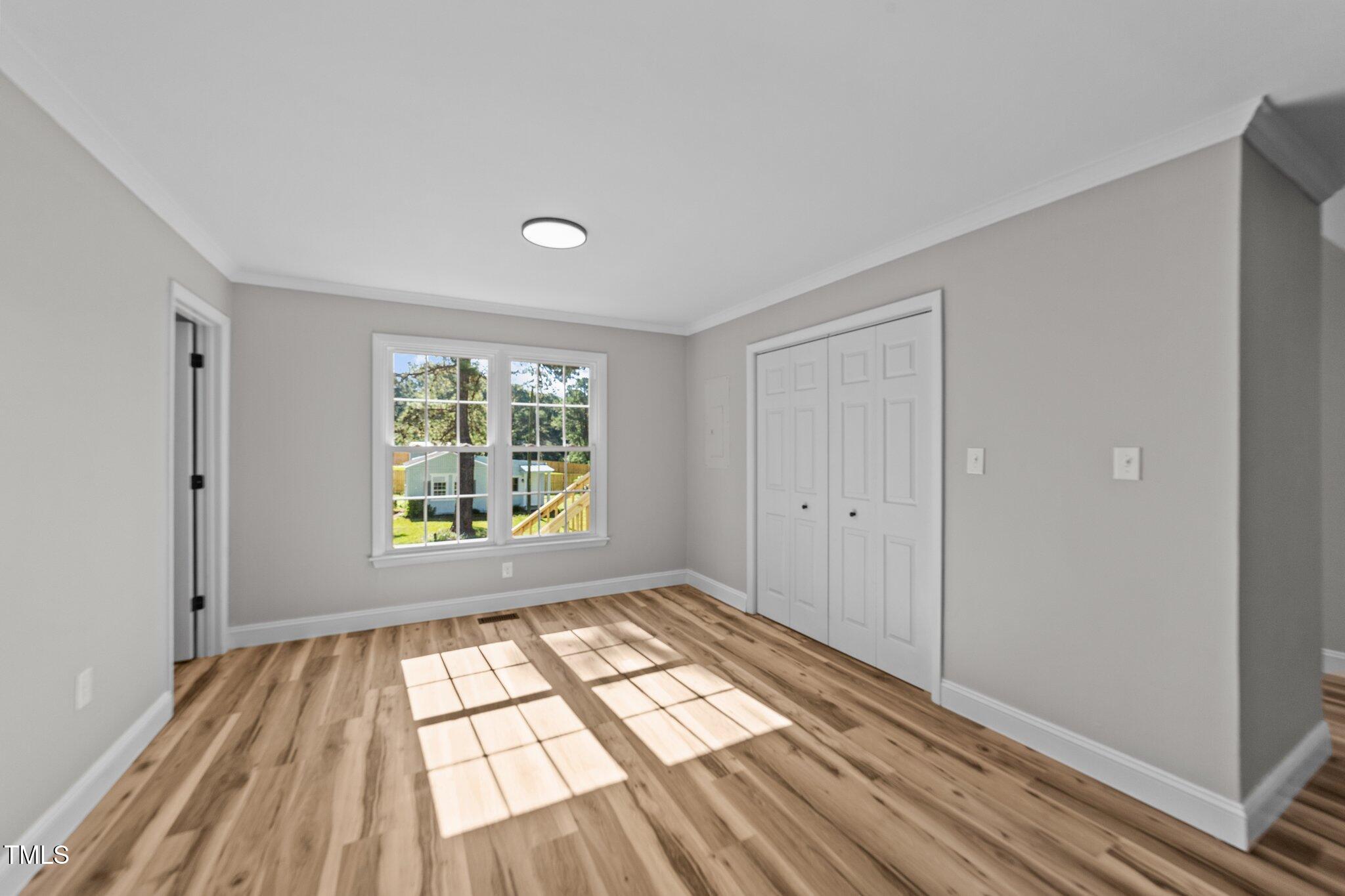 620 Richardson Road Zebulon, NC 27597 - Photo 20 of 52 a view of empty room with window