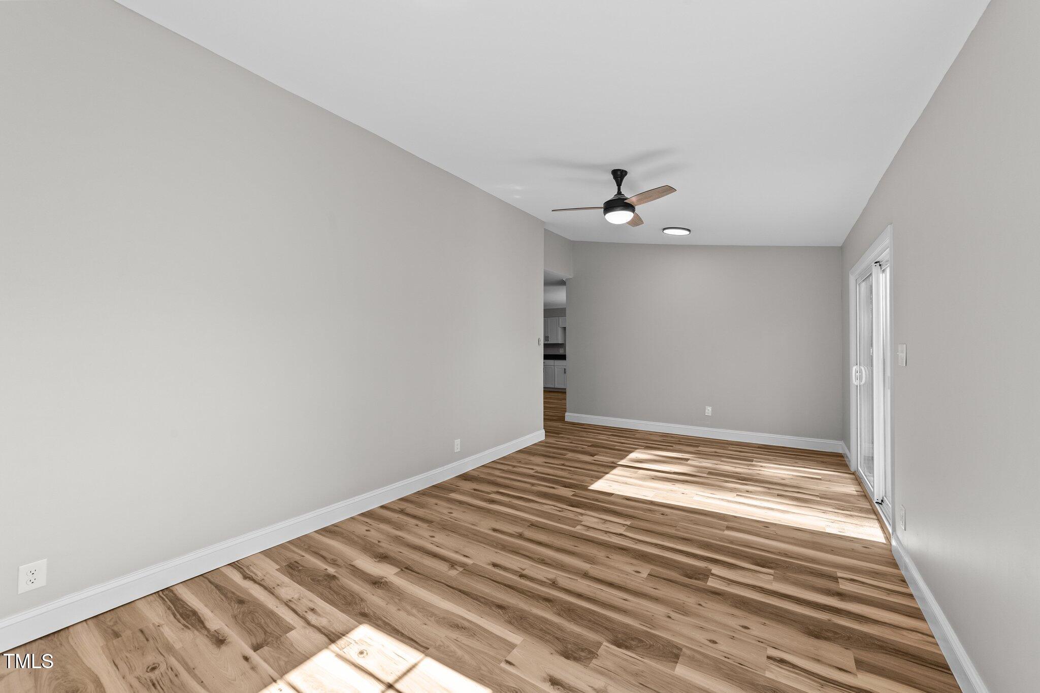620 Richardson Road Zebulon, NC 27597 - Photo 25 of 52 a view of an empty room and a window