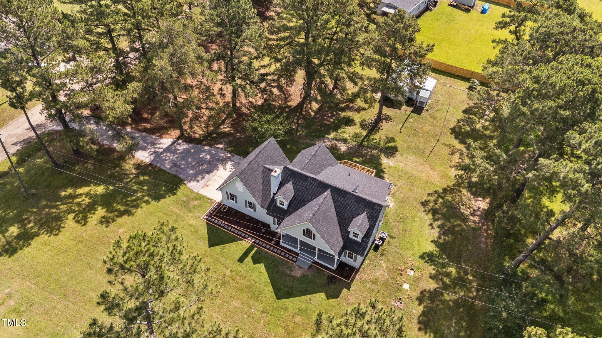 620 Richardson Road Zebulon, NC 27597 - Photo 3 of 52 a view of a house with a yard
