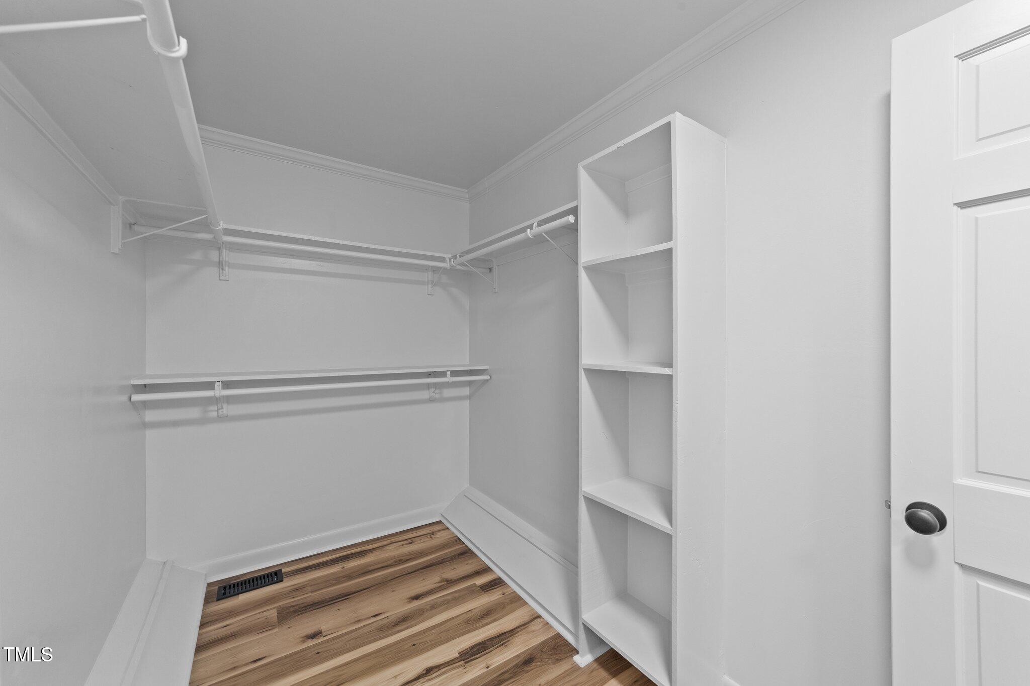 620 Richardson Road Zebulon, NC 27597 - Photo 31 of 52 a view of an empty walk in closet