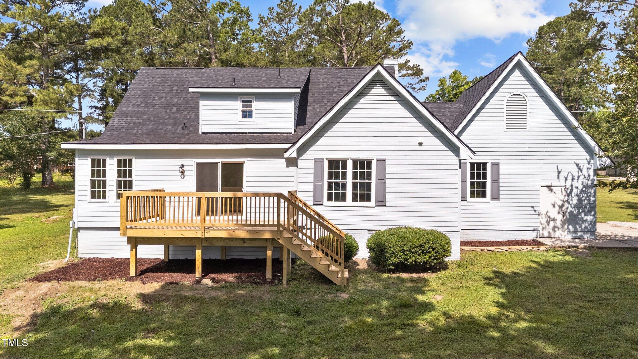 620 Richardson Road Zebulon, NC 27597 - Photo 39 of 52 a view of house with a yard