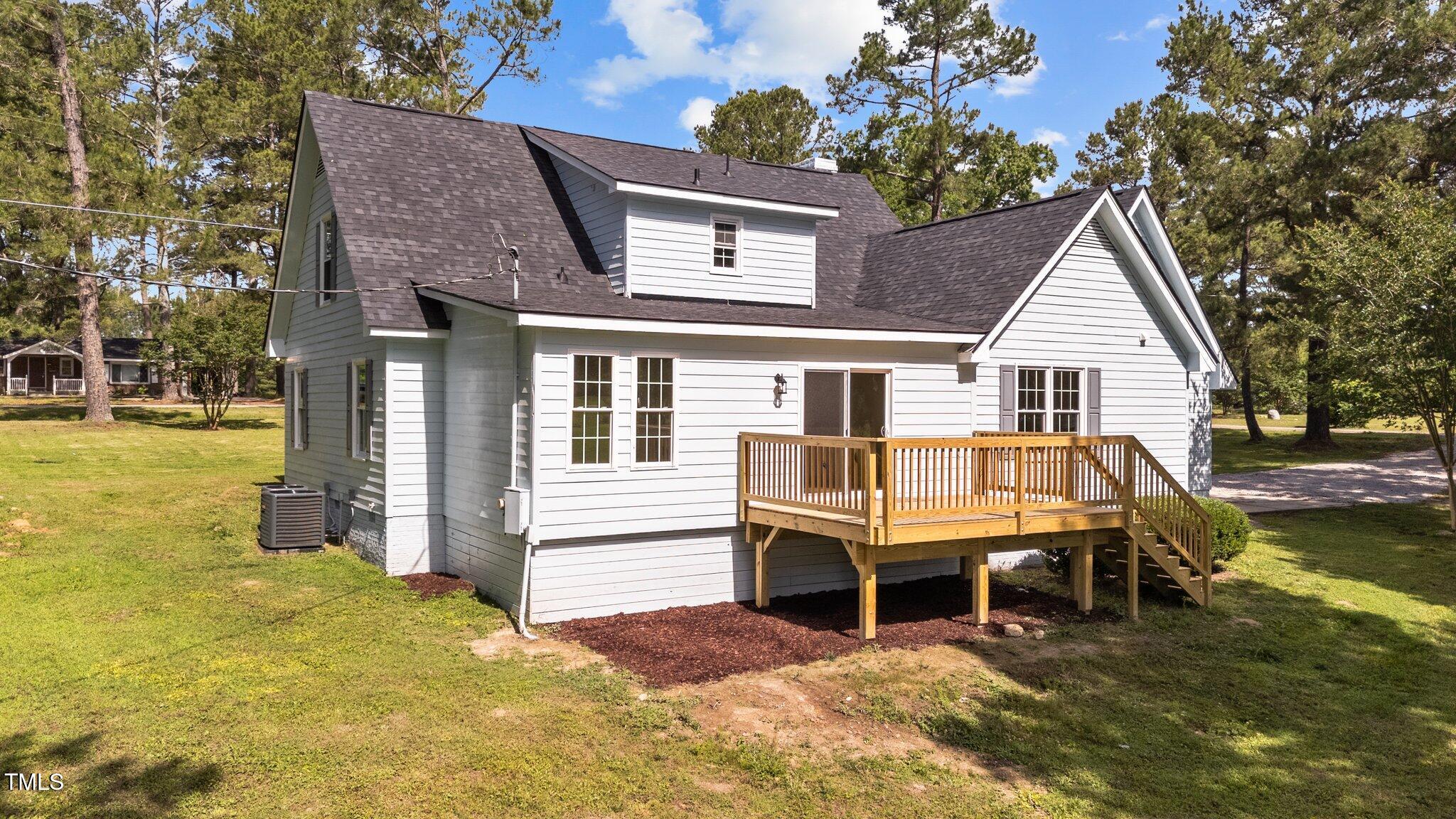 620 Richardson Road Zebulon, NC 27597 - Photo 41 of 52 a house view with a outdoor seating space