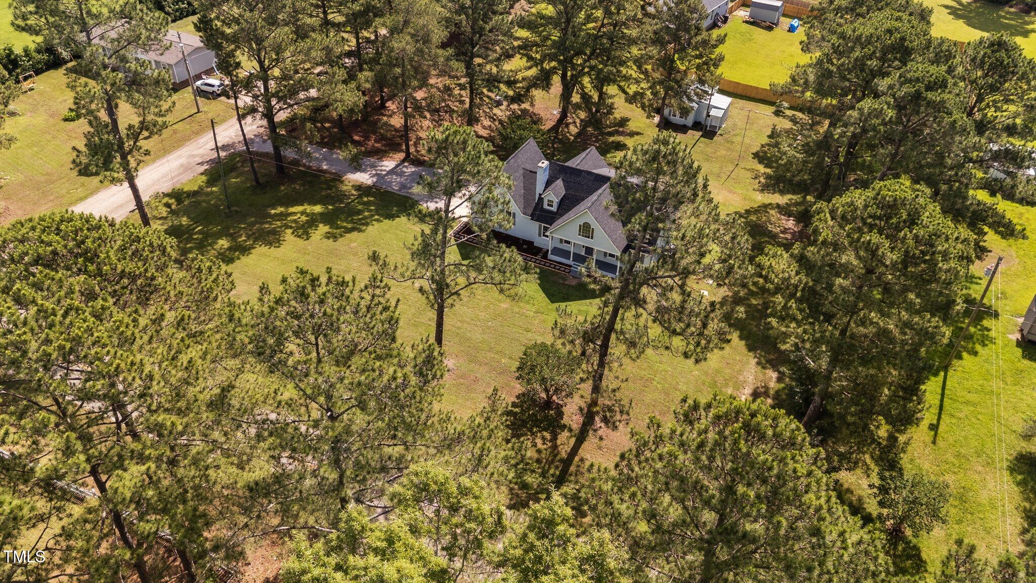 620 Richardson Road Zebulon, NC 27597 - Photo 5 of 52 a aerial view of a house with a yard