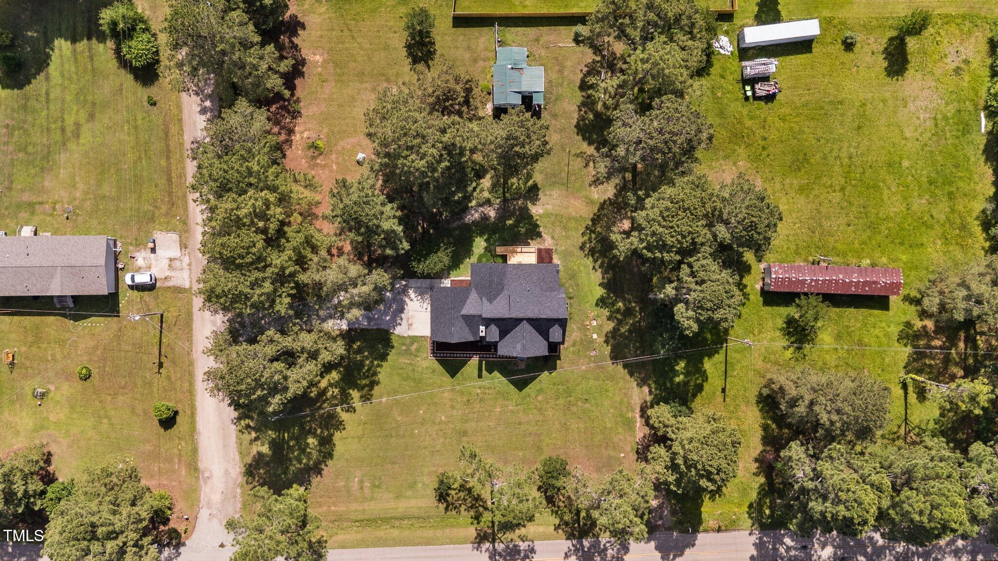 620 Richardson Road Zebulon, NC 27597 - Photo 10 of 52 a aerial view of a house with a yard basket ball court