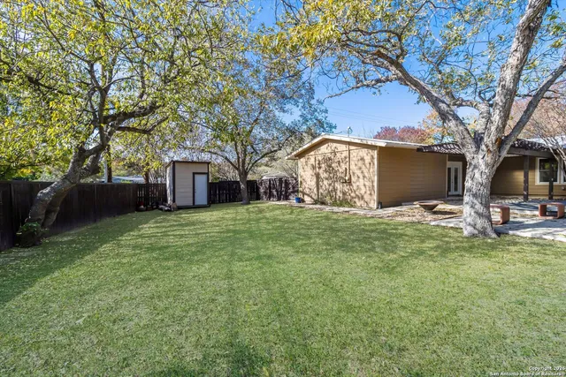 a front view of house with garden