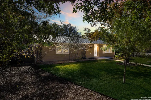 a view of backyard with green space