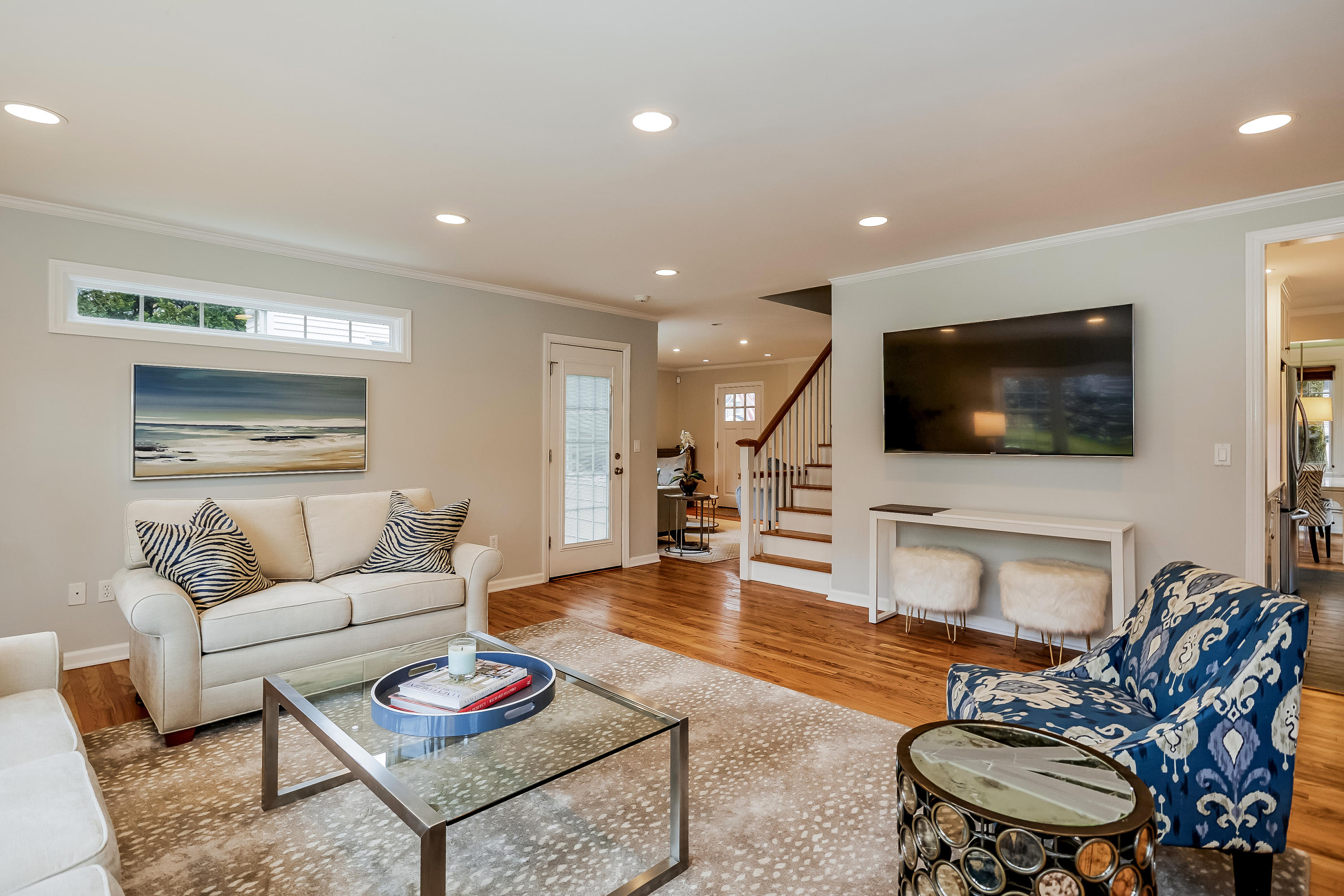 9 Devon Road Darien, CT 06820 - Photo 22 of 49 a living room with furniture and a flat screen tv