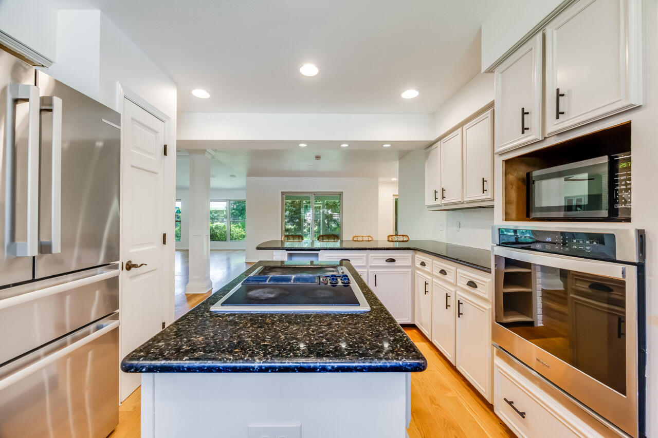 5 Cahaba Court Destin, FL 32541 - Photo 12 of 44 a kitchen with granite countertop a stove and a sink