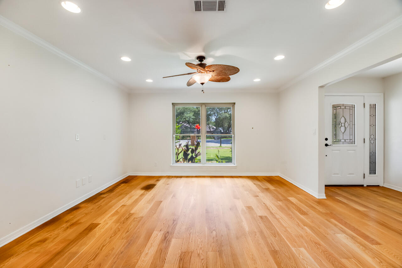 5 Cahaba Court Destin, FL 32541 - Photo 16 of 44 wooden floor in an empty room with a window