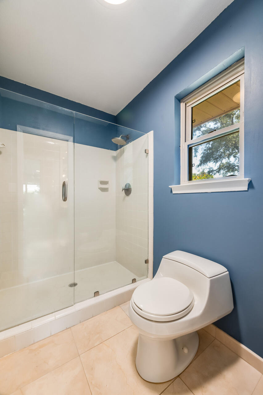 5 Cahaba Court Destin, FL 32541 - Photo 24 of 44 a bathroom with a toilet and a shower