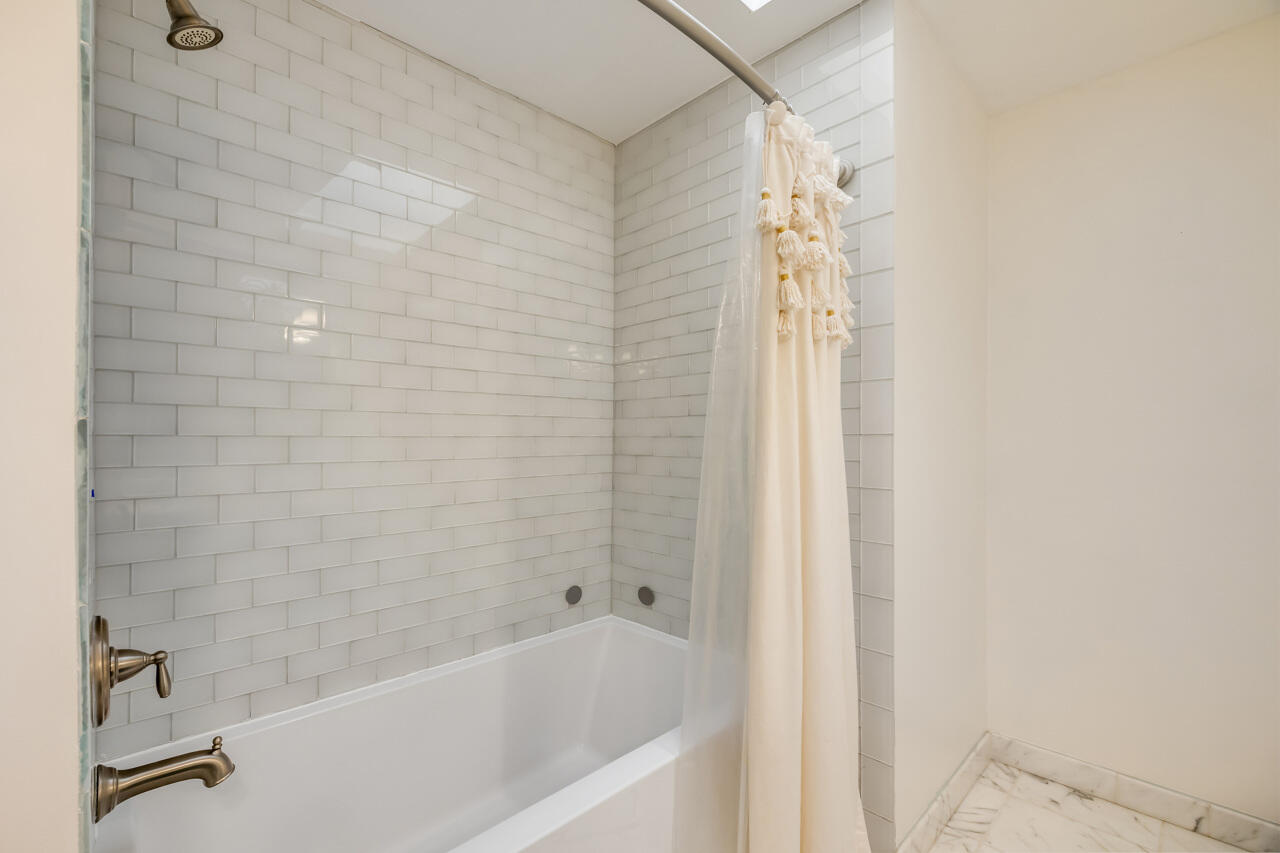 5 Cahaba Court Destin, FL 32541 - Photo 32 of 44 a bathroom with a bathtub and shower