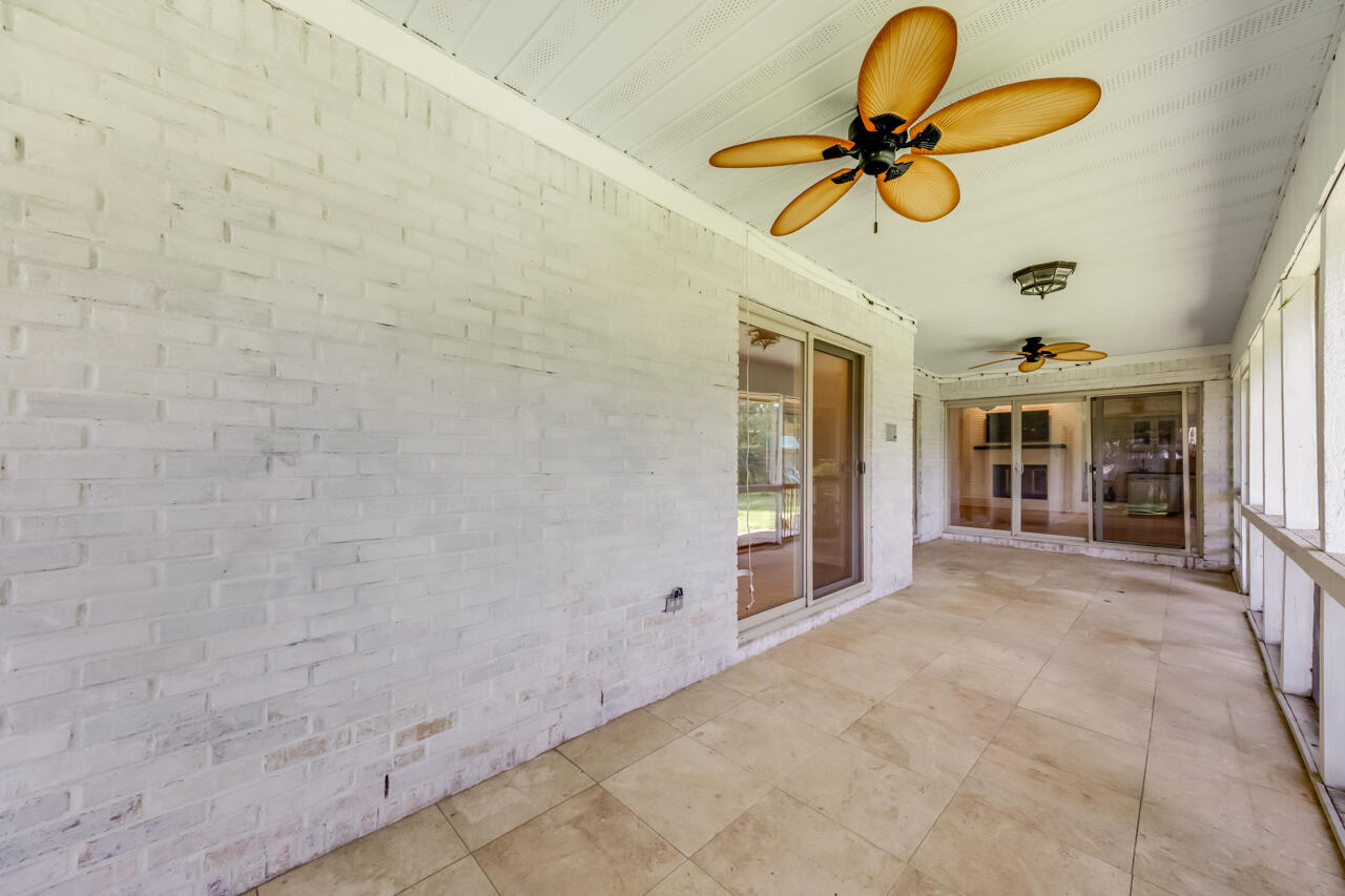 5 Cahaba Court Destin, FL 32541 - Photo 35 of 44 a view of a livingroom with a projector and furniture