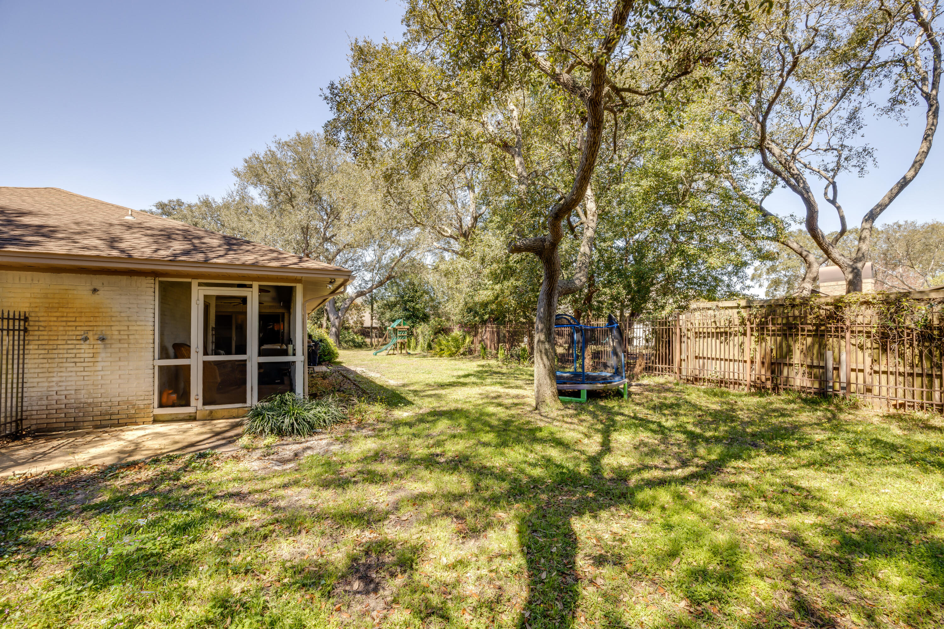 5 Cahaba Court Destin, FL 32541 - Photo 38 of 44 a view of a house with a large tree and a yard