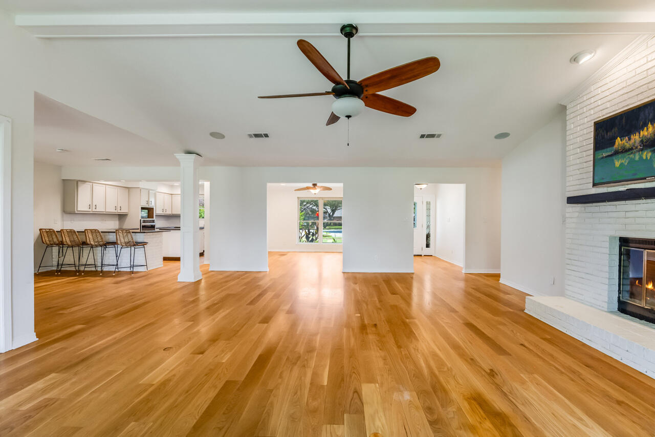 5 Cahaba Court Destin, FL 32541 - Photo 6 of 44 a view of empty room with wooden floor and fan