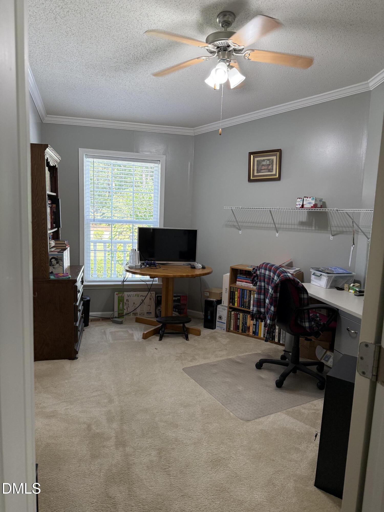 598 Ridge View Drive Cameron, NC 28326 - Photo 13 of 22 a view of a livingroom with workspace and a window