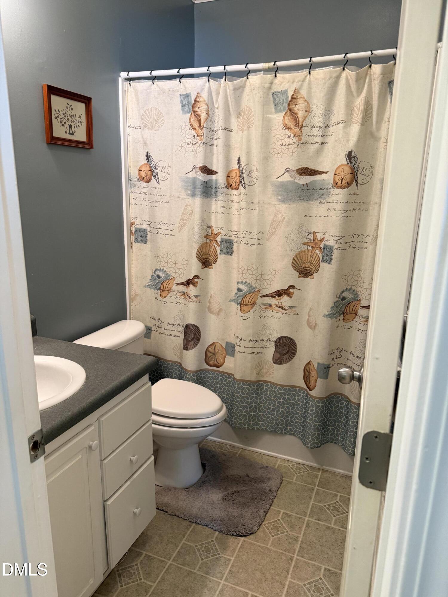 598 Ridge View Drive Cameron, NC 28326 - Photo 17 of 22 a bathroom with a granite countertop sink toilet and shower