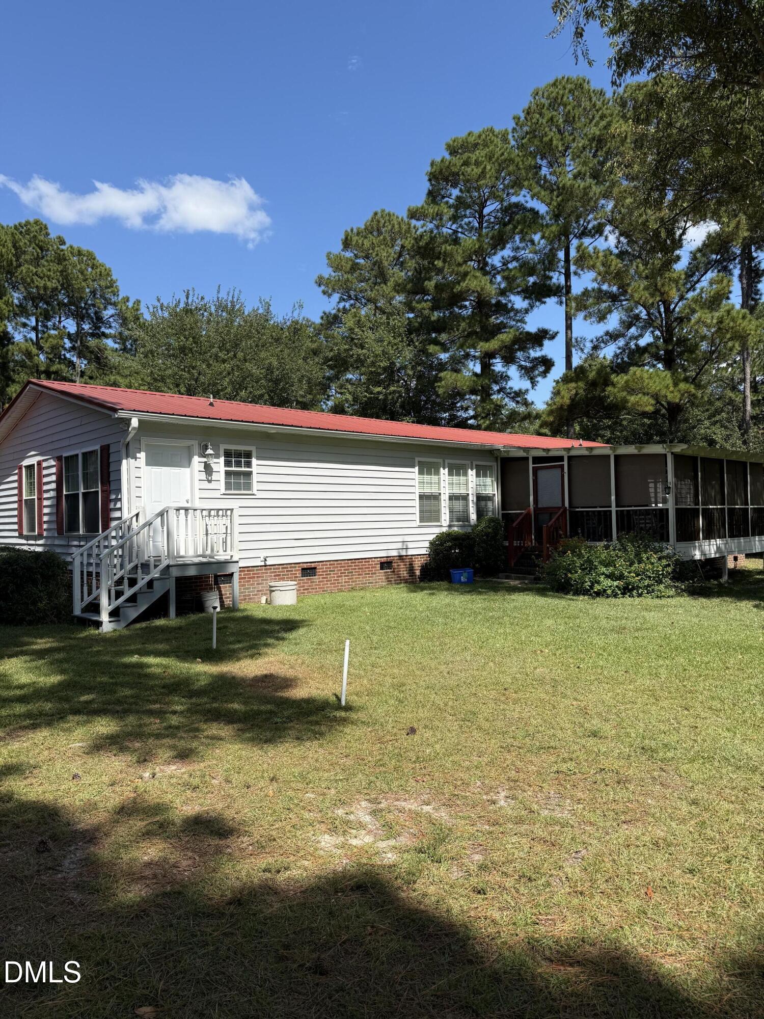 598 Ridge View Drive Cameron, NC 28326 - Photo 2 of 22 a view of a house with a swimming pool