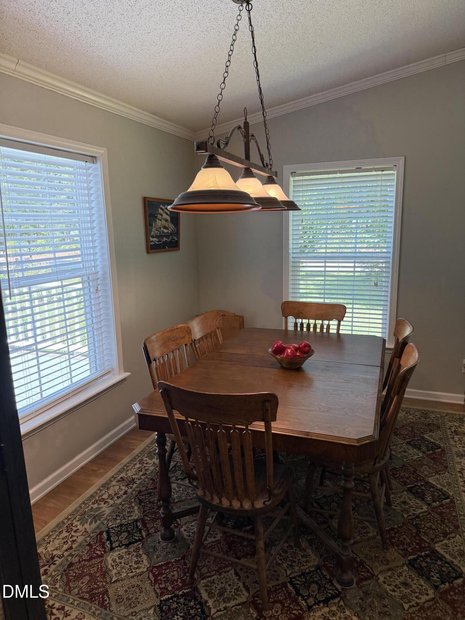 598 Ridge View Drive Cameron, NC 28326 - Photo 7 of 22 a view of a dining room with furniture and window