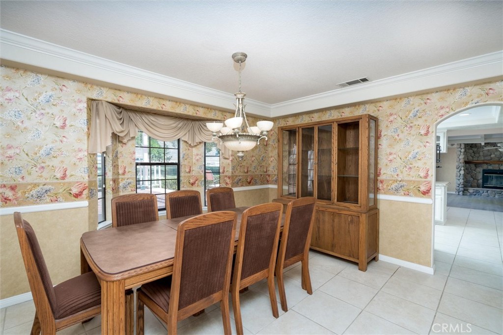 34150 Stowe Road Winchester, CA 92545 - Photo 23 of 80 a view of a dining room with furniture window and outside view