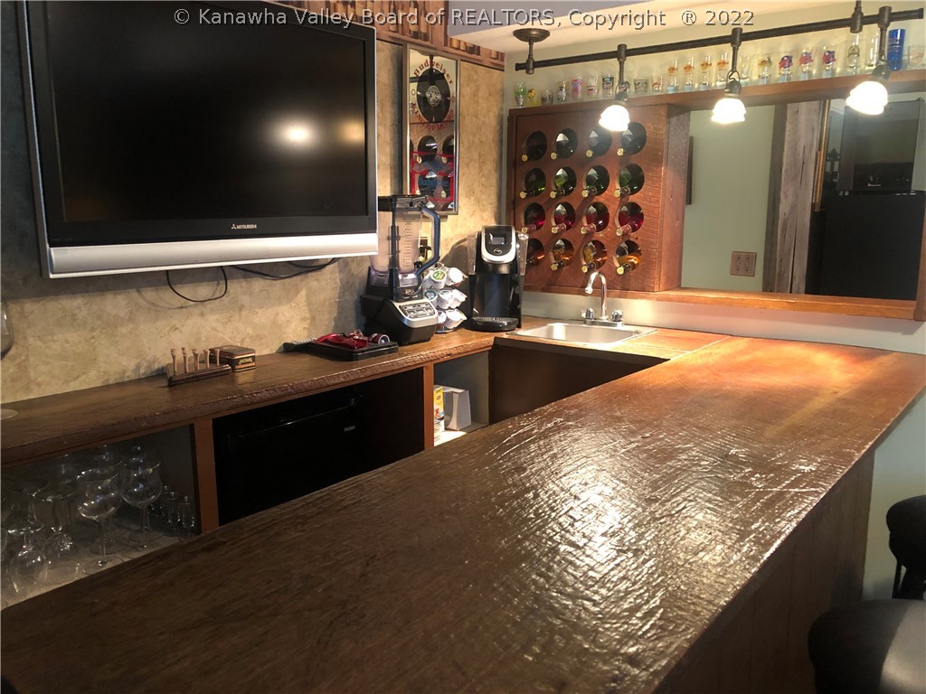 148 English Road East Point Pleasant, WV 25550 - Photo 23 of 44 BAR IN FAMILY ROOM